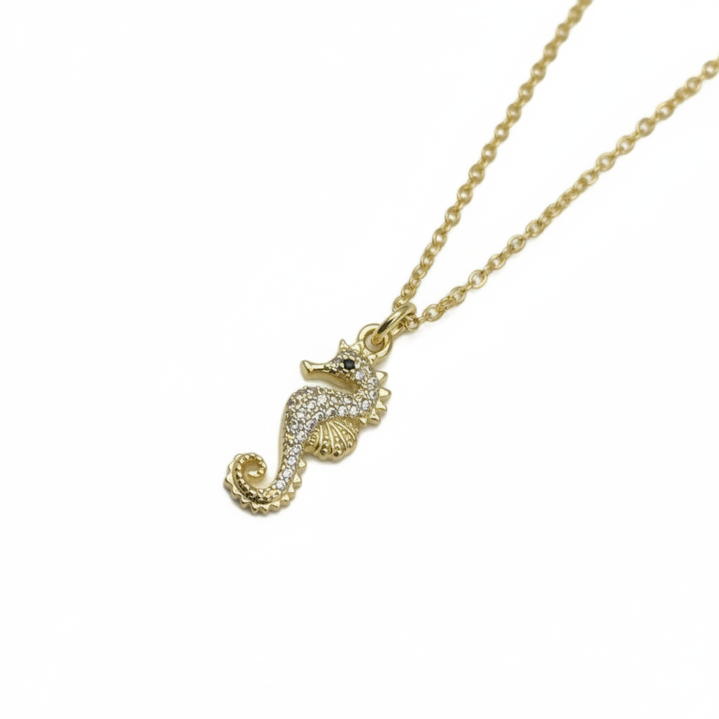 Textured gold seahorse necklace charm necklace showing intricate 22mm pendant detail and chain links