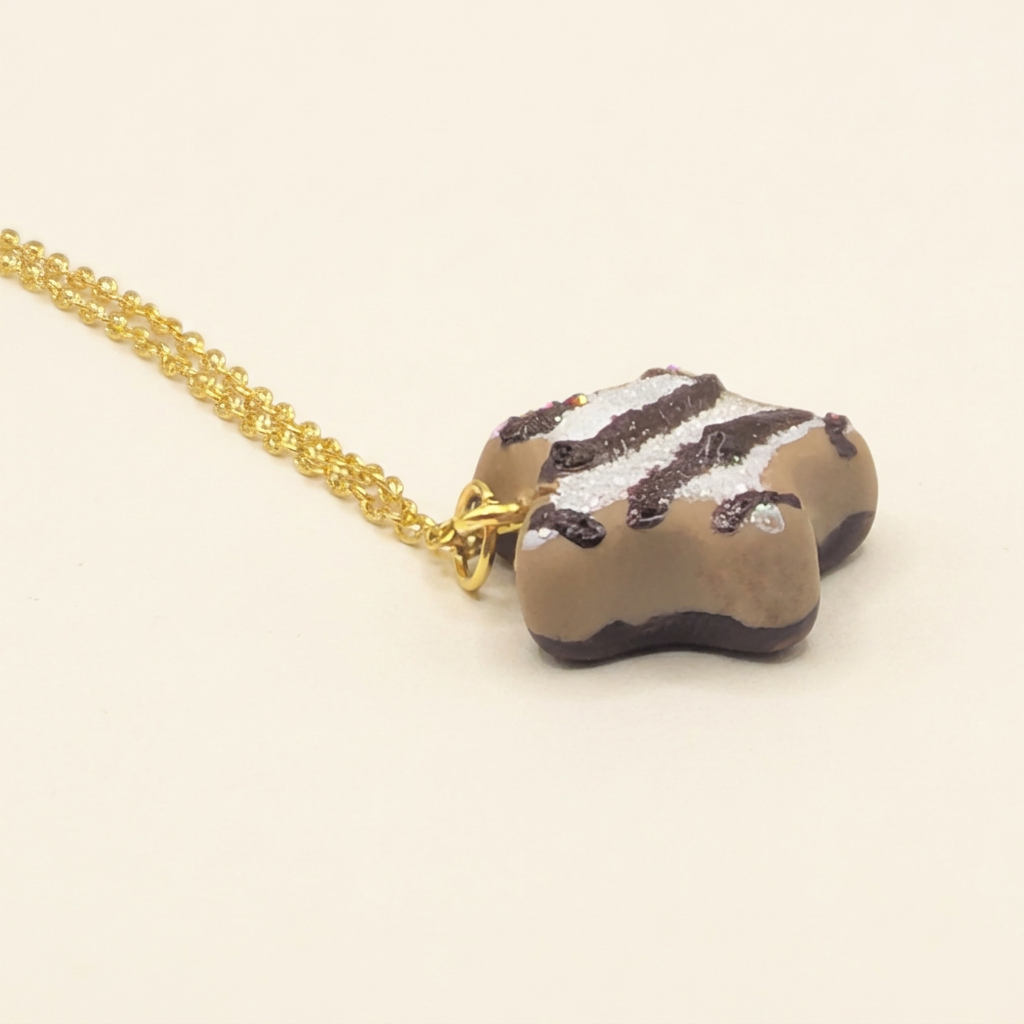 Miniature Lebkuchen Star Cookie Necklace side view showing biscuit-brown star shape