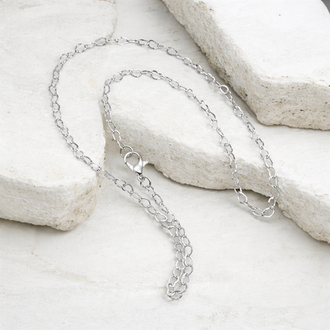 Closeup hollow heart silver chain necklace handmade jewellery UK