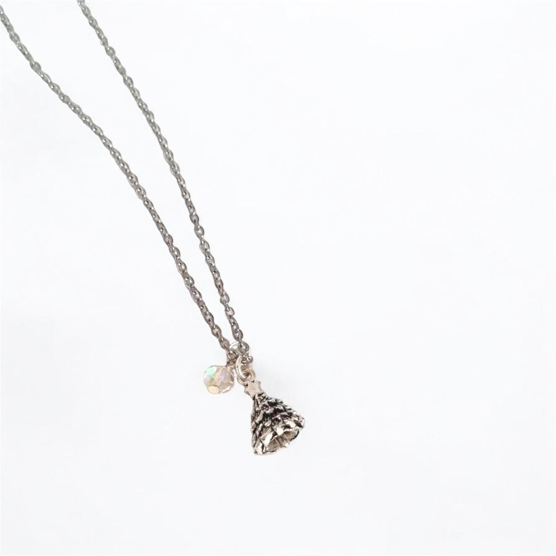 Necklace with a small pendant on a white background