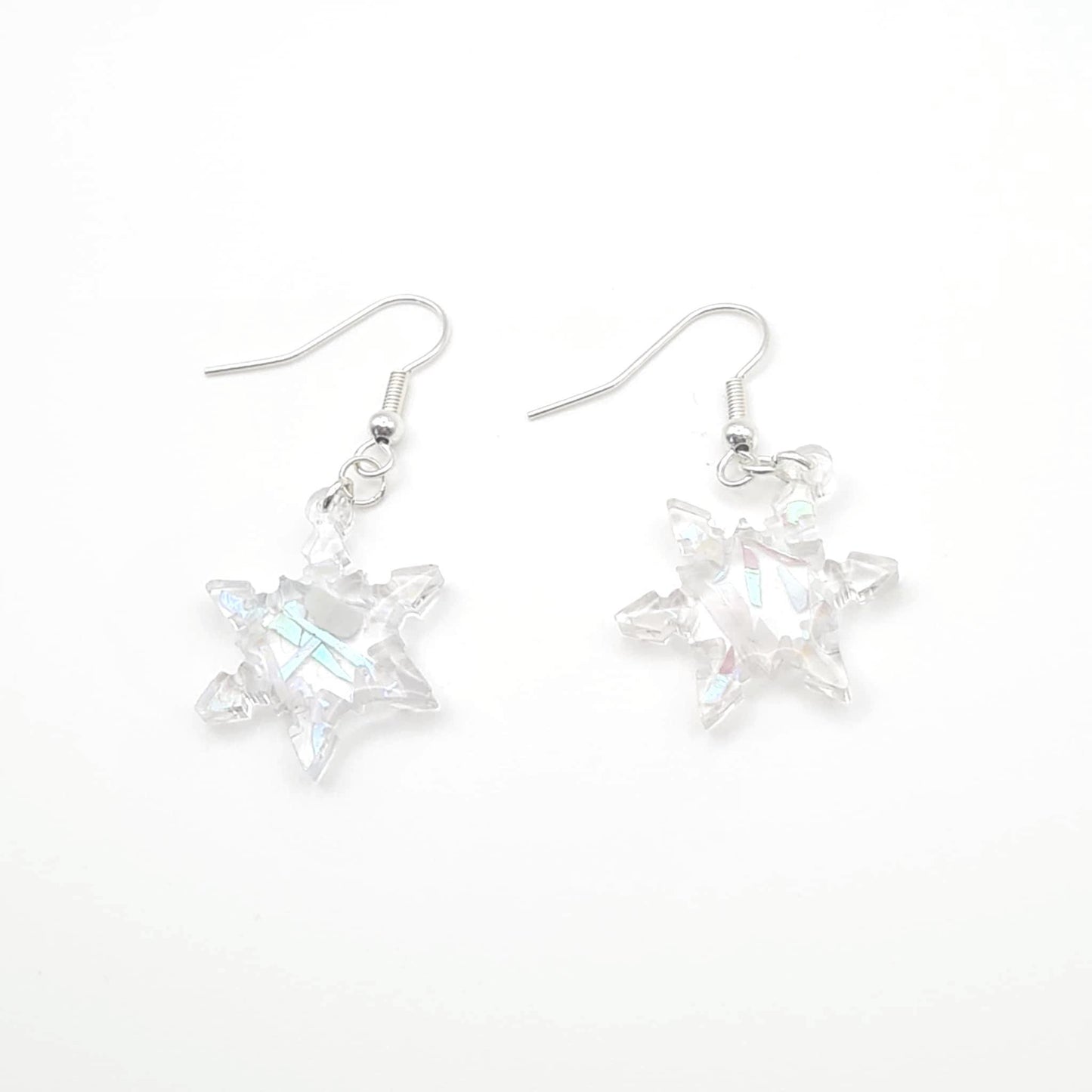 Star-shaped earrings on a white background