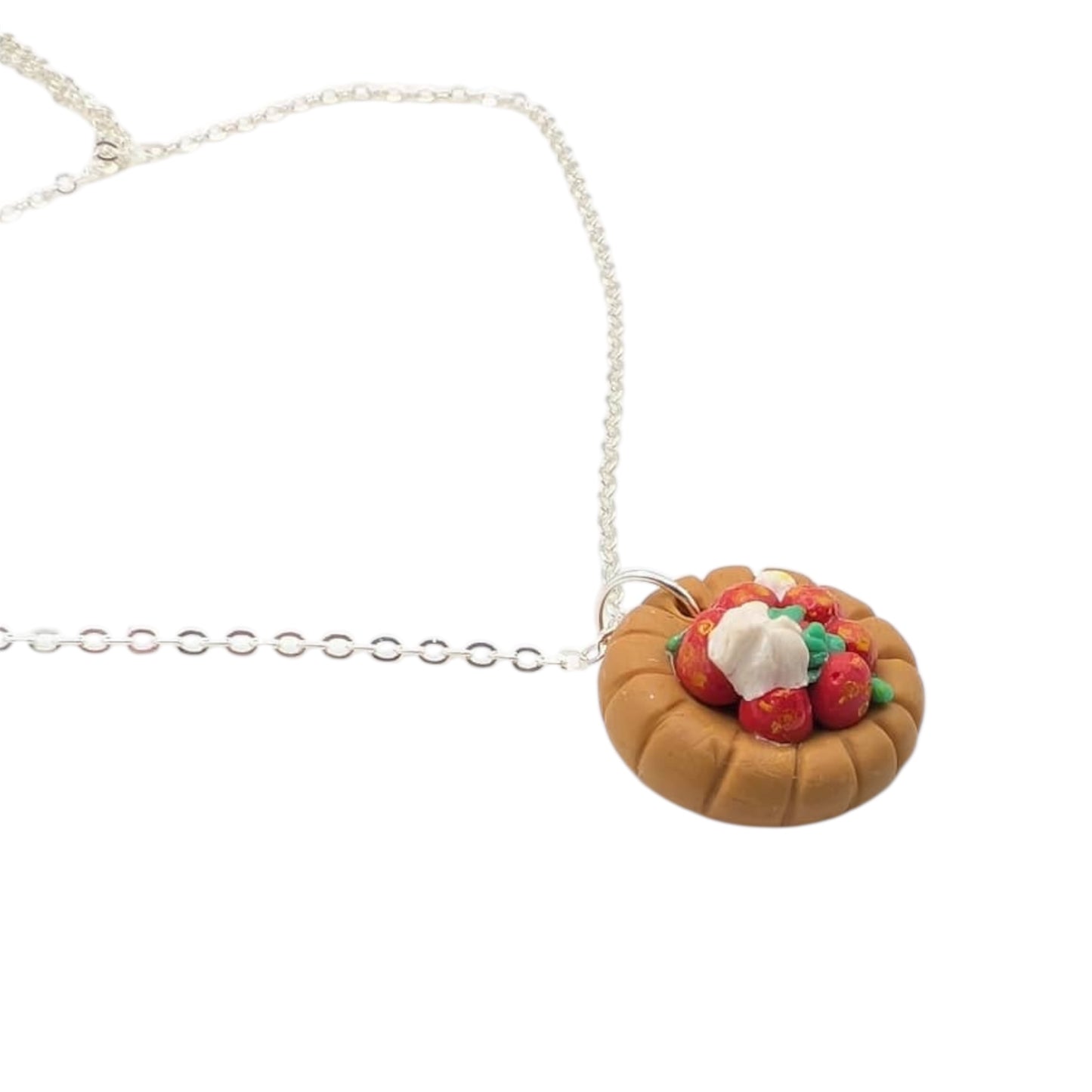 Polymer clay strawberry tart necklace with silver chain on white background 