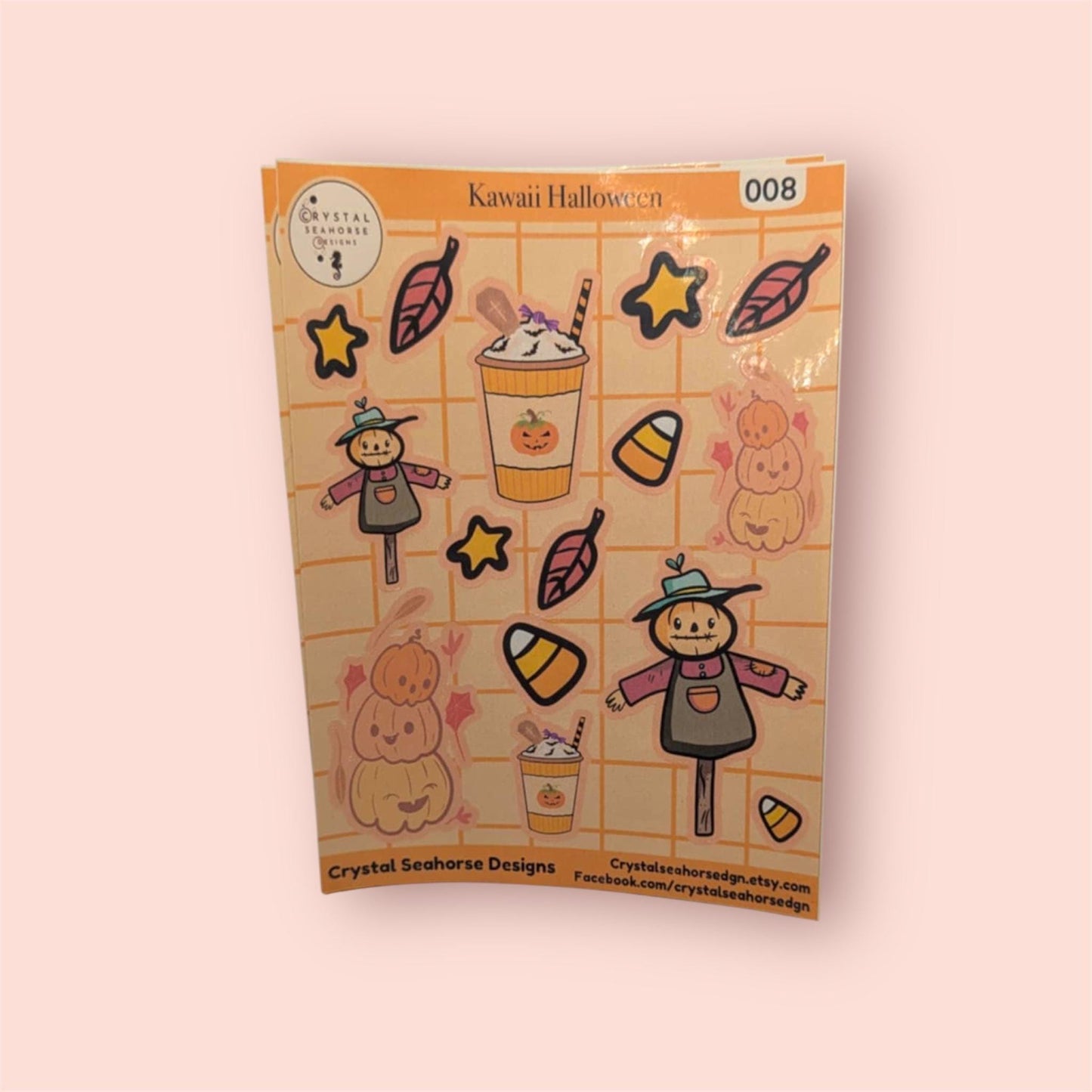 Pack of Kawaii Halloween-themed stickers with cartoon characters and icons on a pink background.