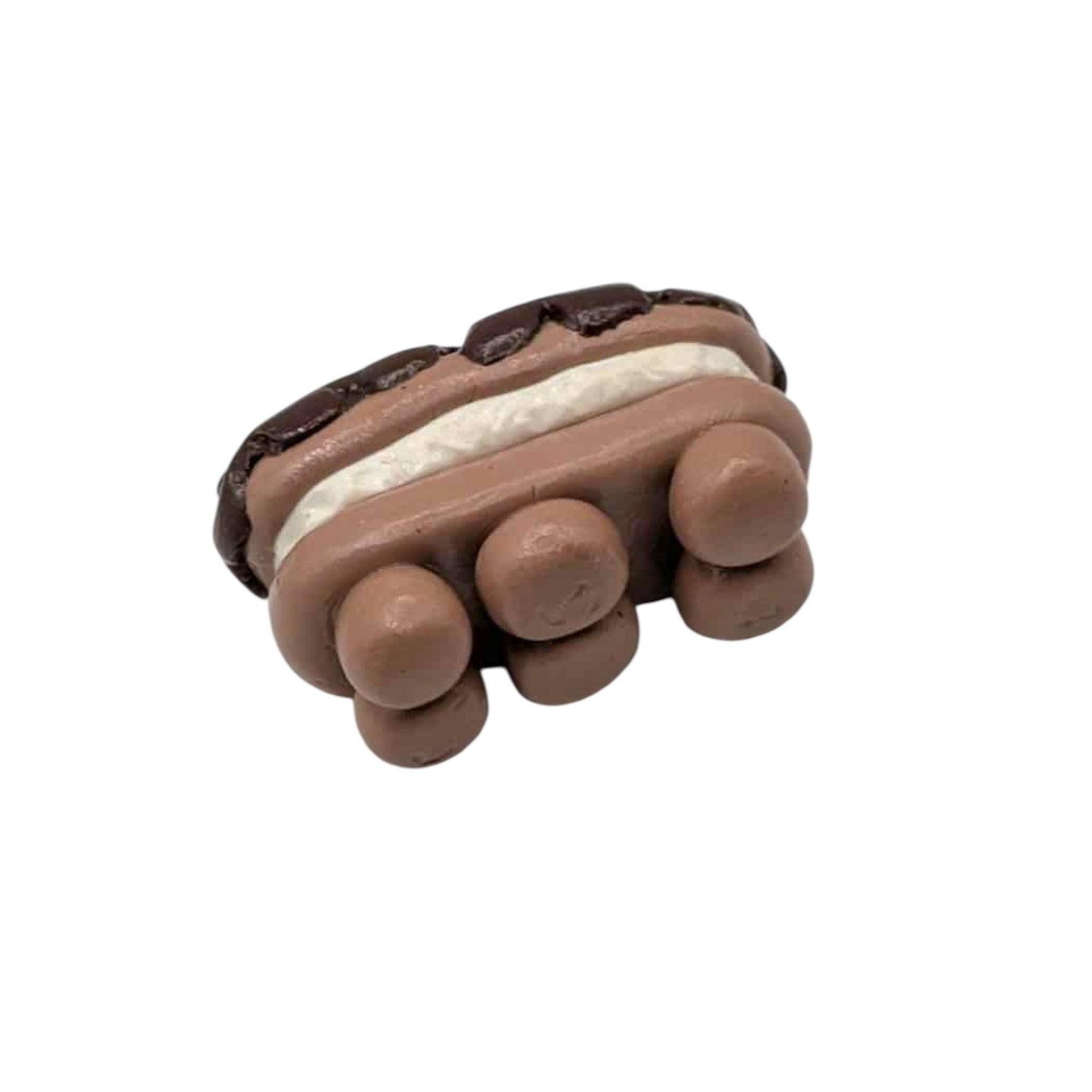 Chocolate eclair with 6 feet with a white filling on a white background