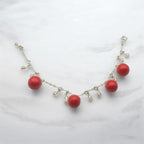 Bracelet with 4 red tomato’s on silver chain with crystal glass accents 