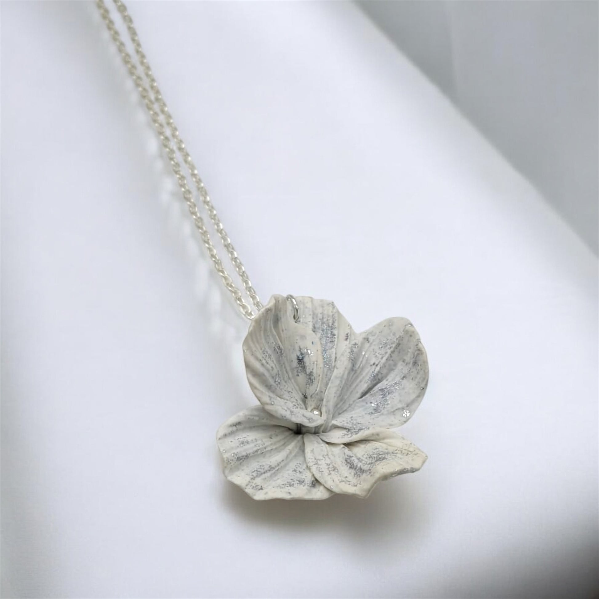 White flower necklace with silver flecks on silver chain - bridal jewellery