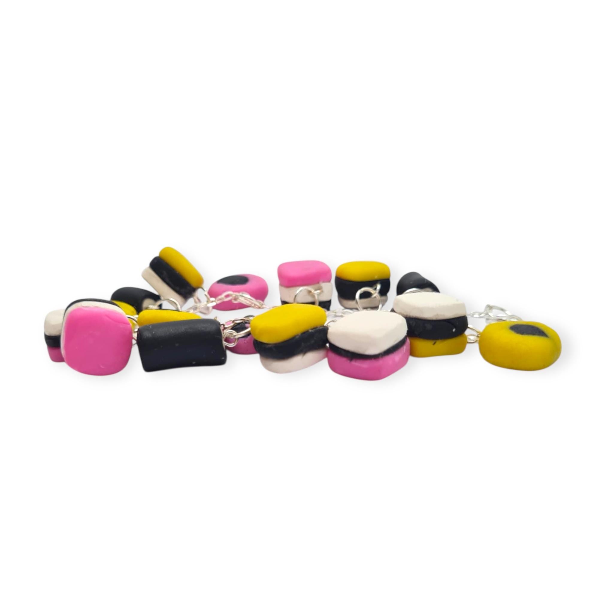 Colourful bracelet with square-shaped charms on a white background